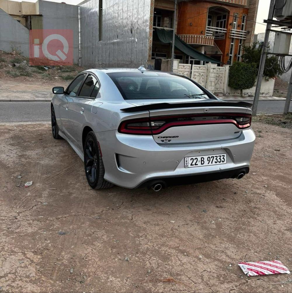 دۆج چارجەر